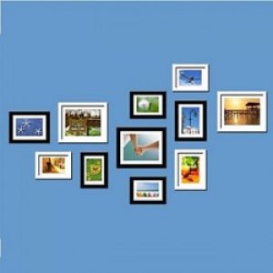 Ensemble de 11 cadres photos en style contemporain en bois noir et blanc