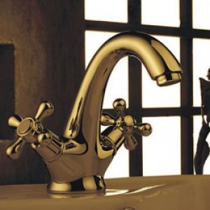 Robinet de lavabo dorée muni de deux poignées, style moderne