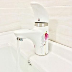Robinet de lavabo en céramique orné d’une fleur rose
