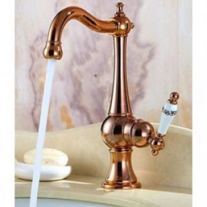 Robinet de lavabo rose or fini en laiton avec poignée unique, un robinet rotatif à design antique
