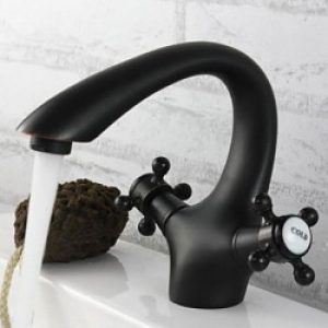 Robinet d&rsquo;évier avec bec à courbure, style traditionnel fini en bronze huilé et muni de deux poignées