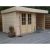 Cabanon de jardin bois emboité + Bucher