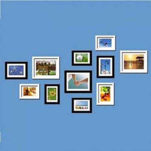 Ensemble de 11 cadres photos en style contemporain en bois noir et blanc