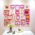 Ensemble de 22 cadres photos de style contemporain en bois rose