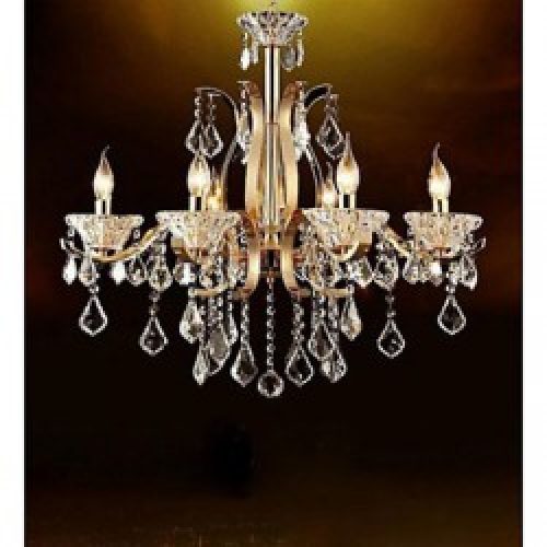 Lustre en Cristal et fer forgé doré à 8 lumières