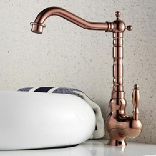 Robinet salle de bain de couleur rose or muni d&rsquo;une poignée unique, finition en laiton